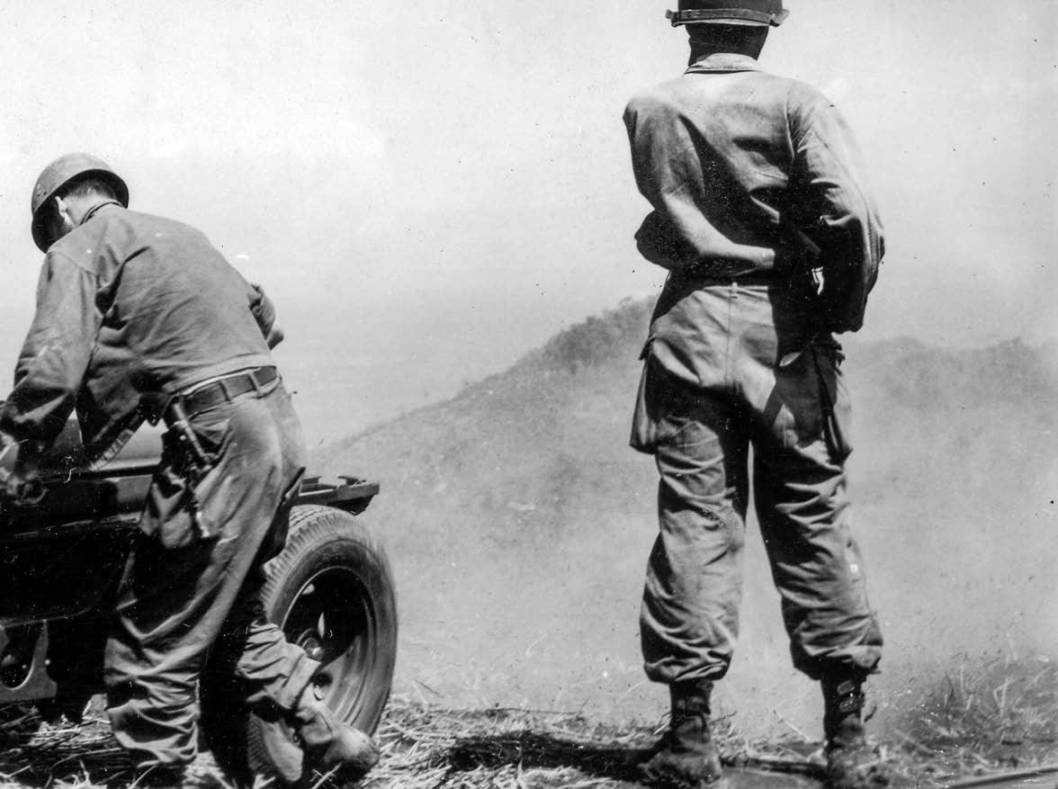 Members of D Battery, 457th Parachute
Field Artillery Battalion, fire 75mm gun
point blank at caves on hillside, near Lipa,
Batangas, Luzon, April 27, 1945 (National
Archives and Records Administration/U.S.
Army Signal Corps/Robinson)